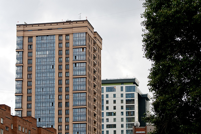 Picture of two highrise buildings in close proximity to one another